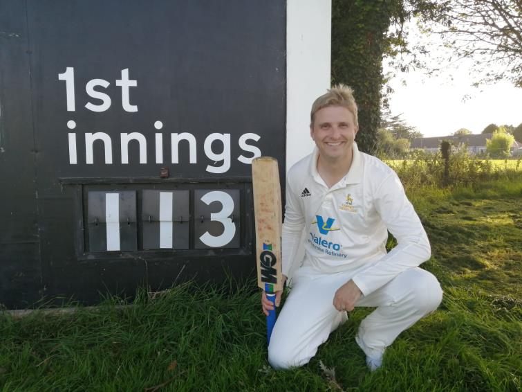 Peter McGilloway shows his magic batting total - pic by Hywel Gibbs